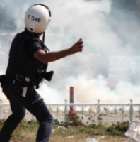Turkish riot police attack trade unionists with tear gas during the Gezi Park protests.