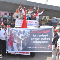 Workers in India show solidarity with their comrades in Bangladesh on a May Day march.